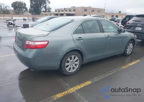2007 Toyota Camry Xle z USA, uszkodzony, nr VIN JTNBE46K873062874
